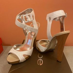 Bebe white 5 inch heel in excellent condition...